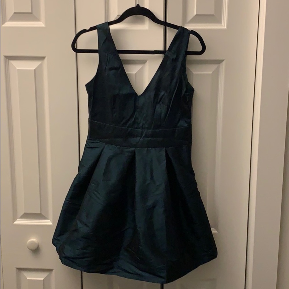 Mini emerald green dress with bow low back